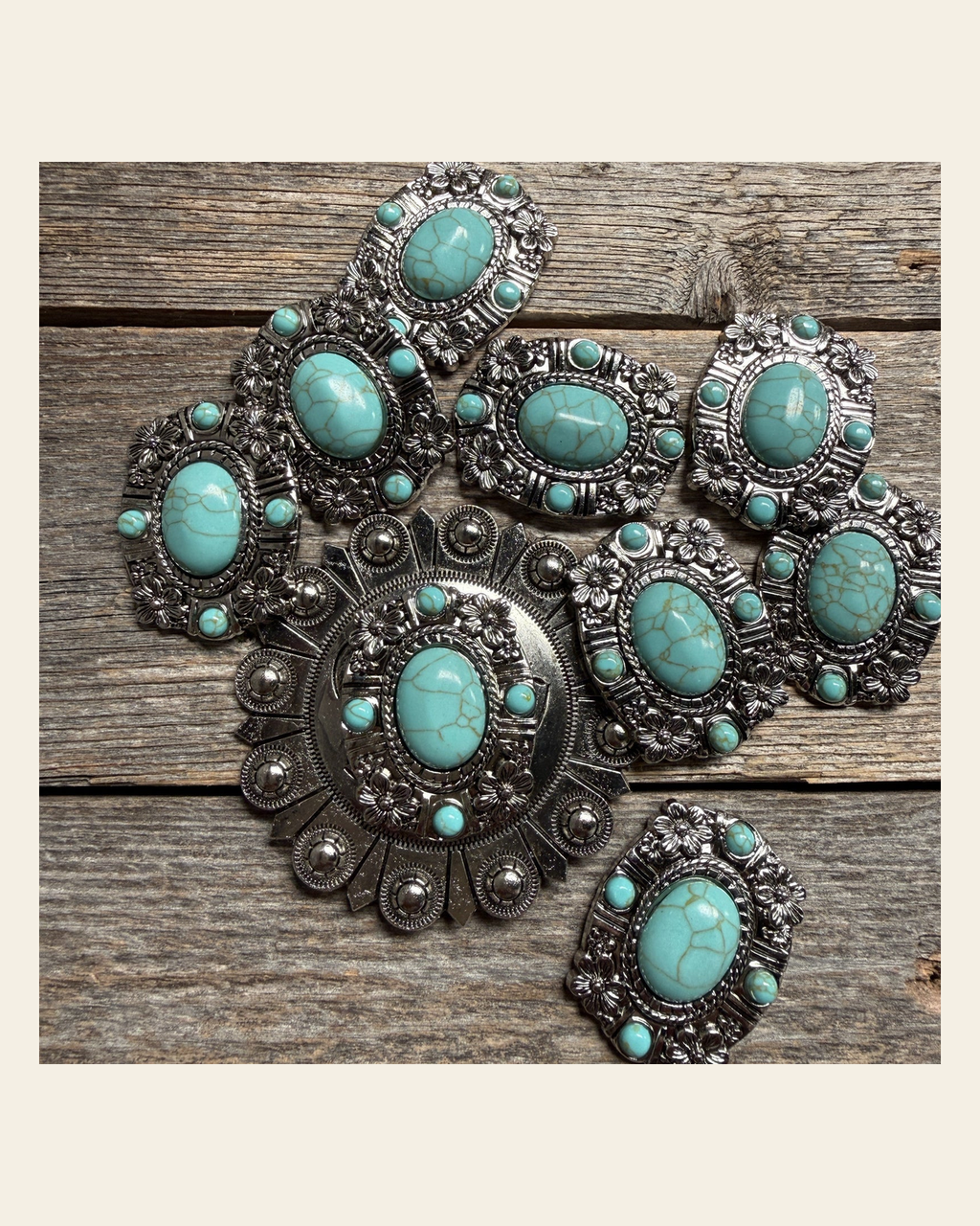 Antique Silver Floral and Turquoise Concho W260 on a warm cream background