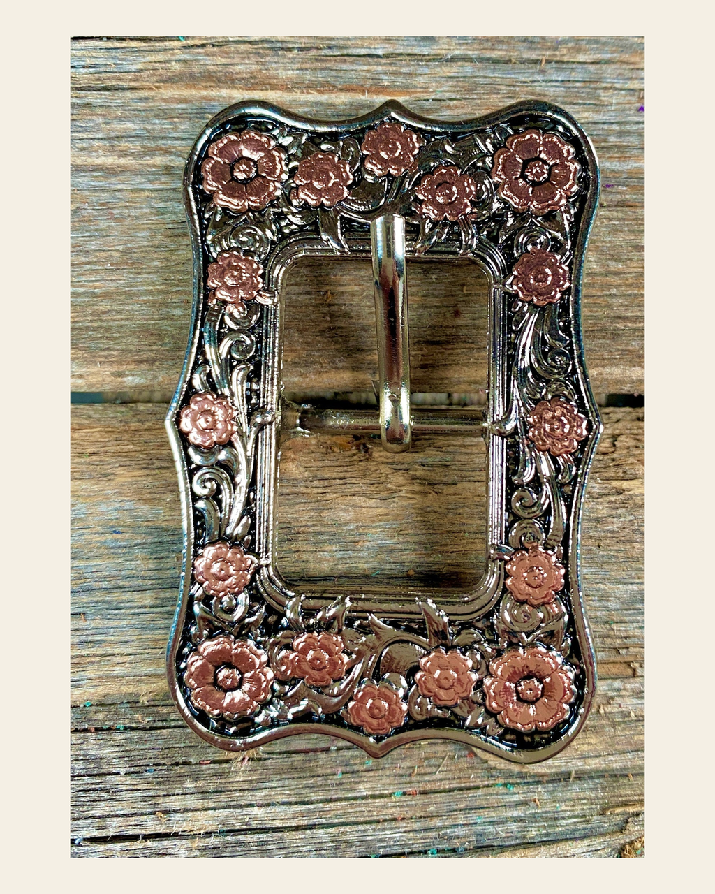 Antique Silver Floral Cart Buckle W151B on a warm cream background