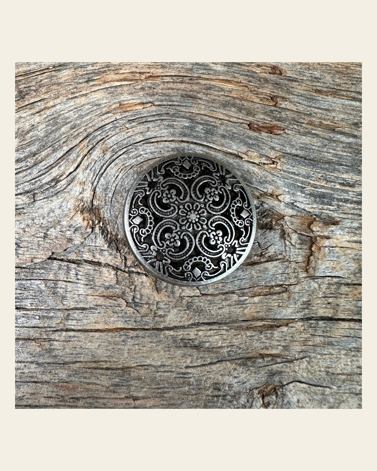 Antique Silver Floral Engraved Concho 1" W225S on a warm cream background