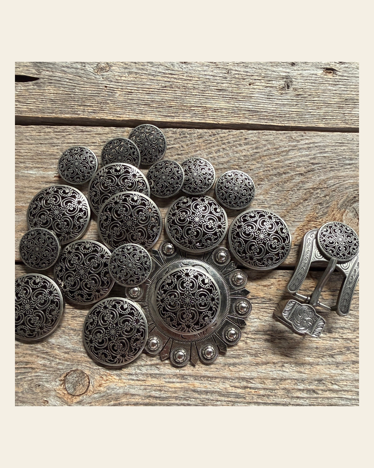 Antique Silver Floral Engraved Western Concho W225 on a warm cream background