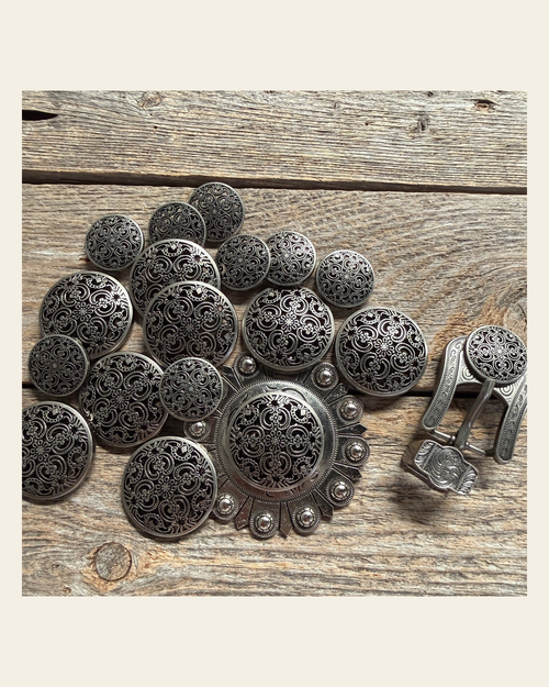 Antique Silver Floral Engraved Western Concho W225 on a warm cream background