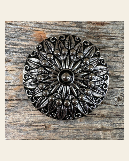 Antique Silver Floral Pinwheel Concho 1.5" W227L on a warm cream background