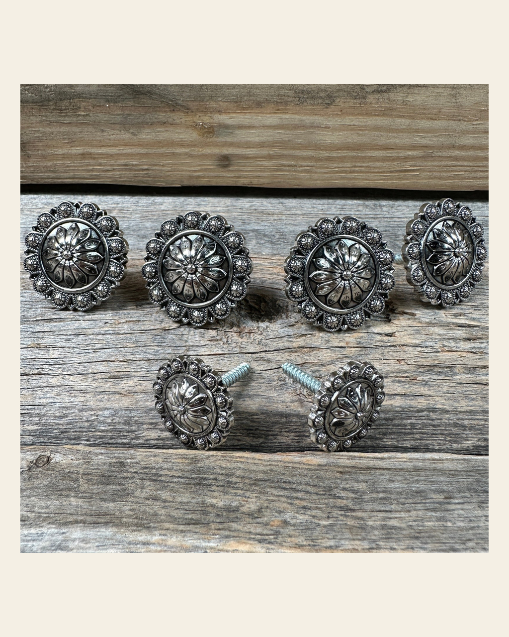 Antique Silver Flower and Berry Saddle Set SSW226 on a warm cream background