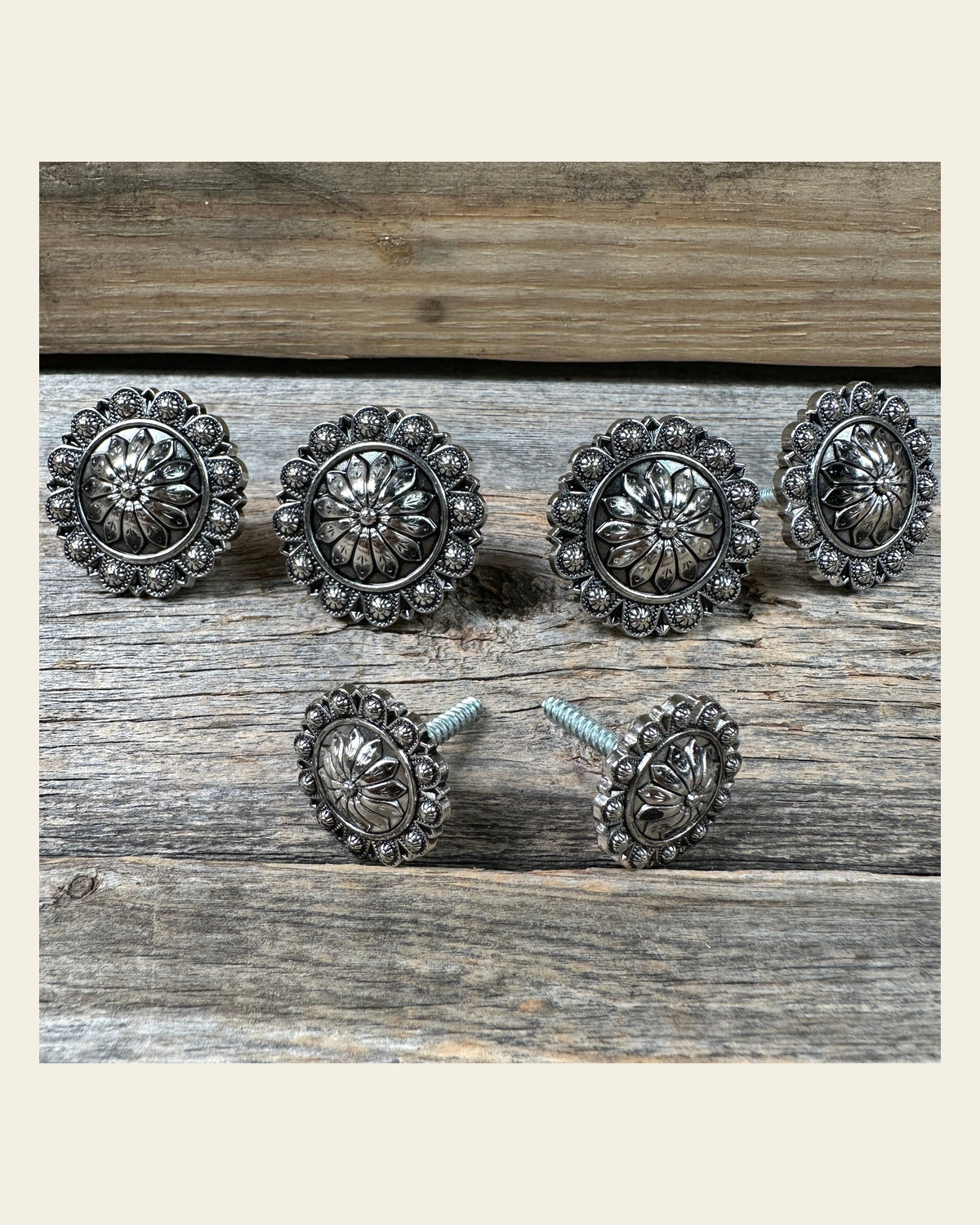 Antique Silver Flower and Berry Saddle Set SSW226 on a warm cream background