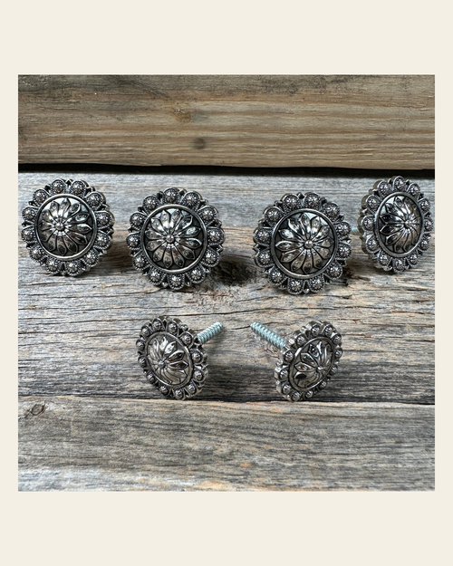 Antique Silver Flower and Berry Saddle Set SSW226 on a warm cream background