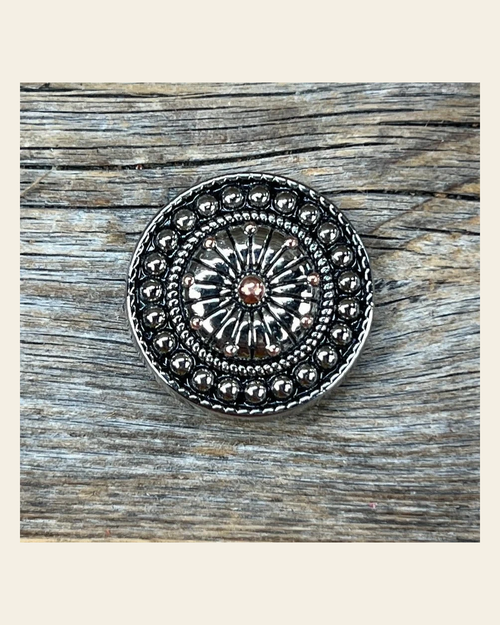 Antique Silver Flower and Dots Concho 1.5" W230L on a warm cream background