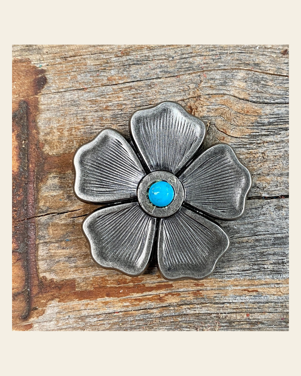 Antique Silver Flower Turquoise Concho 1.5" W110S on a warm cream background