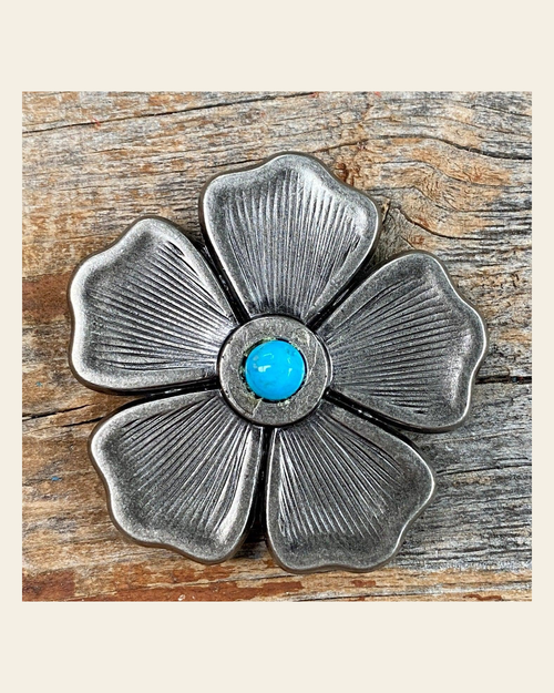 Antique Silver Flower Turquoise Concho 2" W110L on a warm cream background