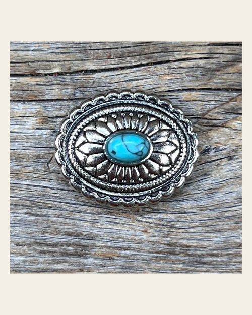 Antique Silver Oval Floral Turquoise Concho 1.5" W237L on a warm cream background