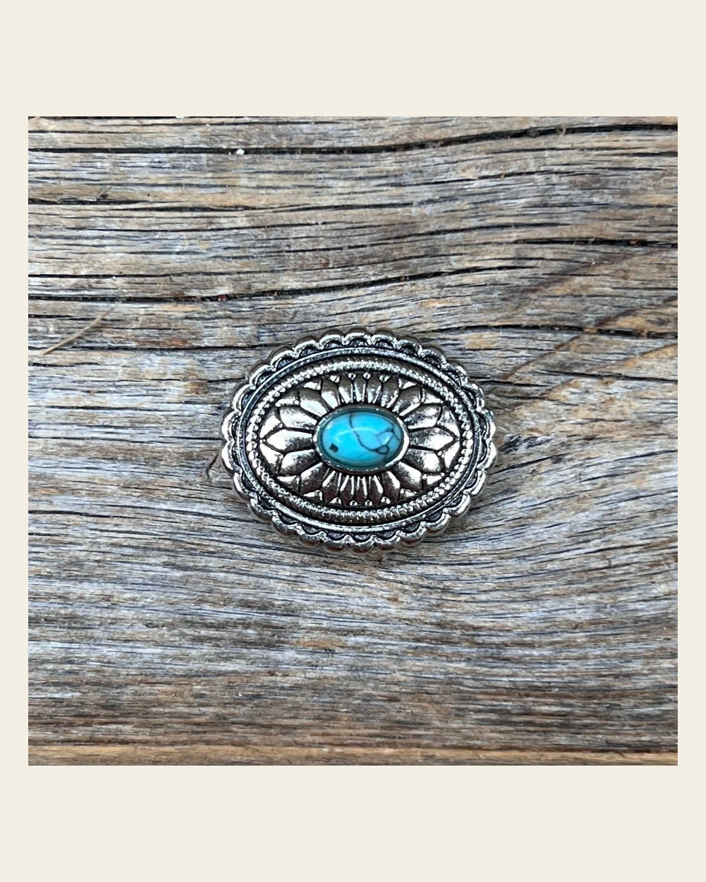 Antique Silver Oval Floral Turquoise Concho 1" W237S on a warm cream background