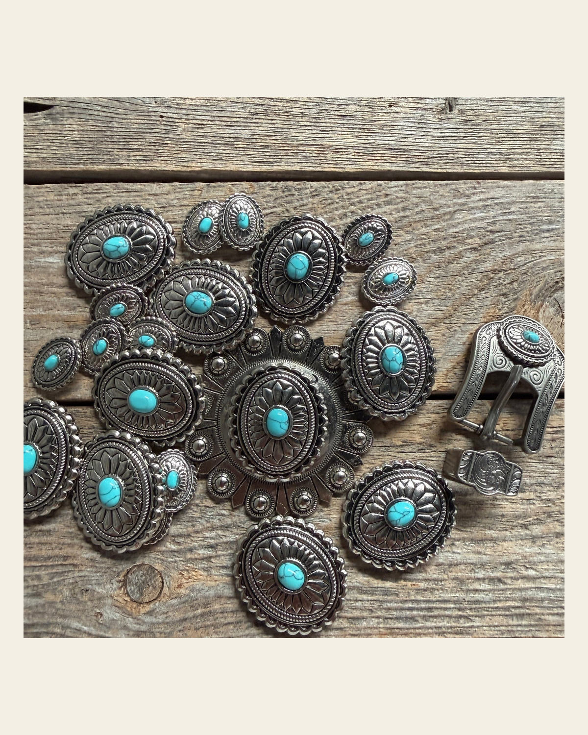 Antique Silver Oval Floral Turquoise Western Concho W237 on a warm cream background