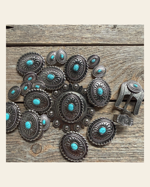 Antique Silver Oval Floral Turquoise Western Concho W237 on a warm cream background