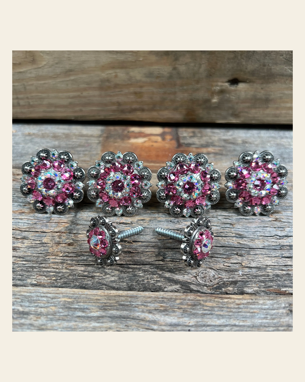 Antique Silver Pink & AB Saddle Conchos on a warm cream background