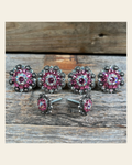 Antique Silver Pink & AB Saddle Conchos on a warm cream background
