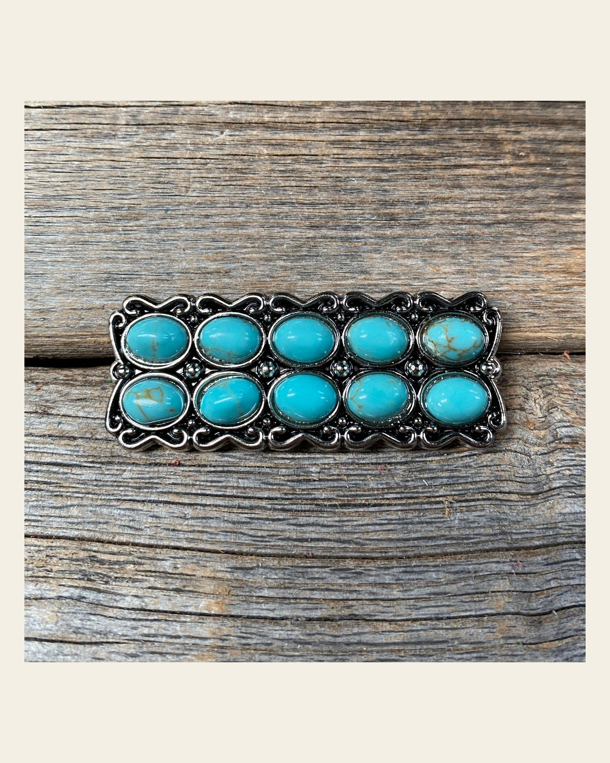 Antique Silver Rectangle Turquoise Concho 2" W216 on a warm cream background