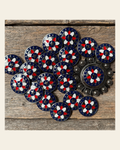 Antique Silver Red, White, and Blue Western Concho W274 on a warm cream background