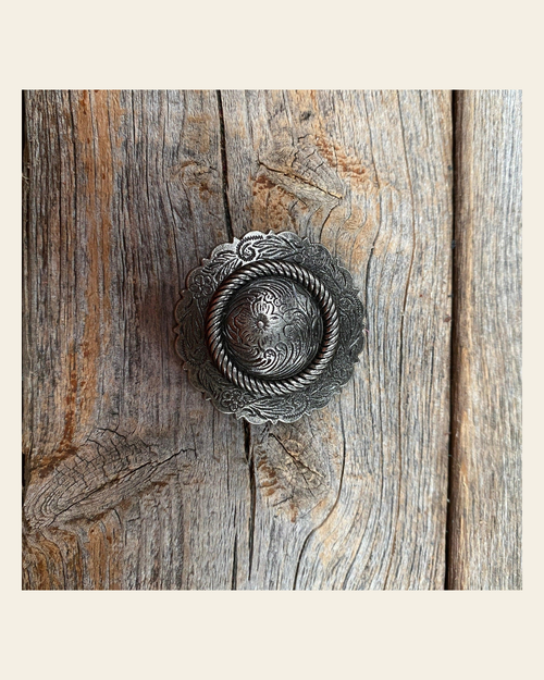 Antique Silver Round Concho 1.5" W102L on a warm cream background