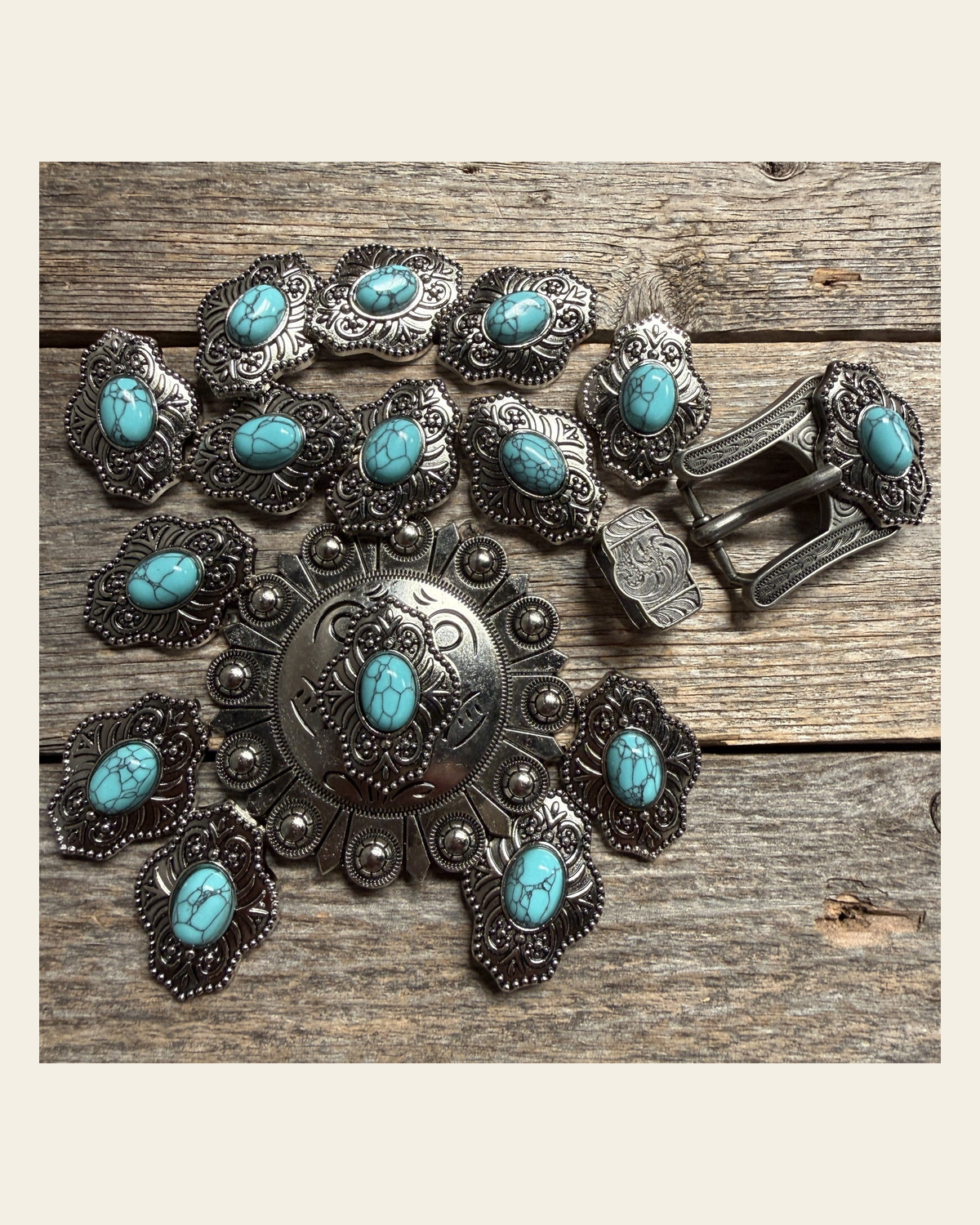 Antique Silver Shield with Turquoise Stone Western Concho W252 on a warm cream background