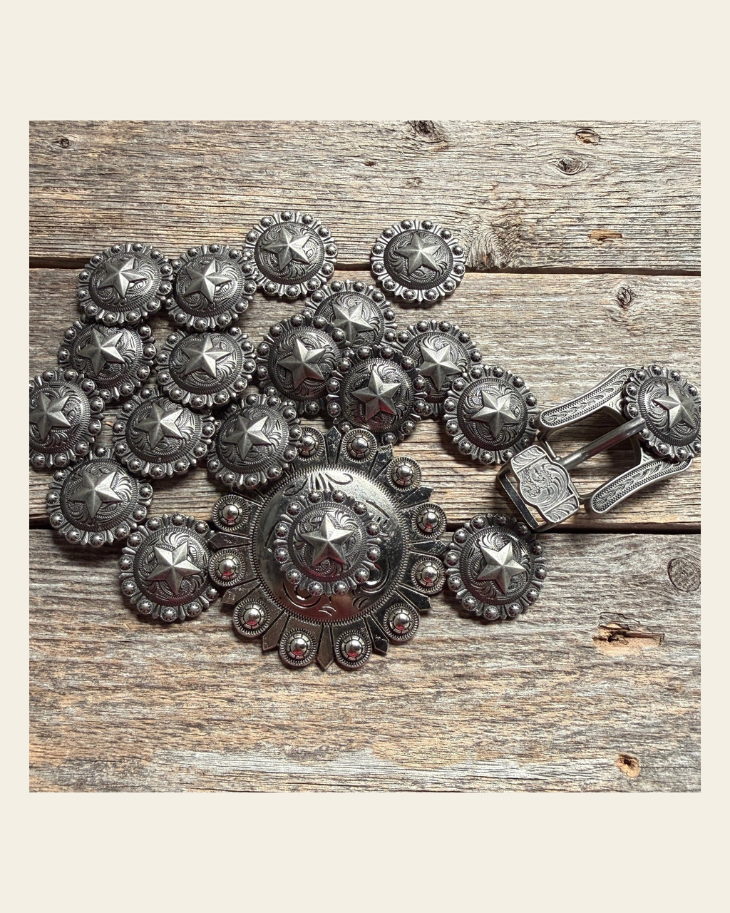 Antique Silver Star Western Concho W174 on a warm cream background