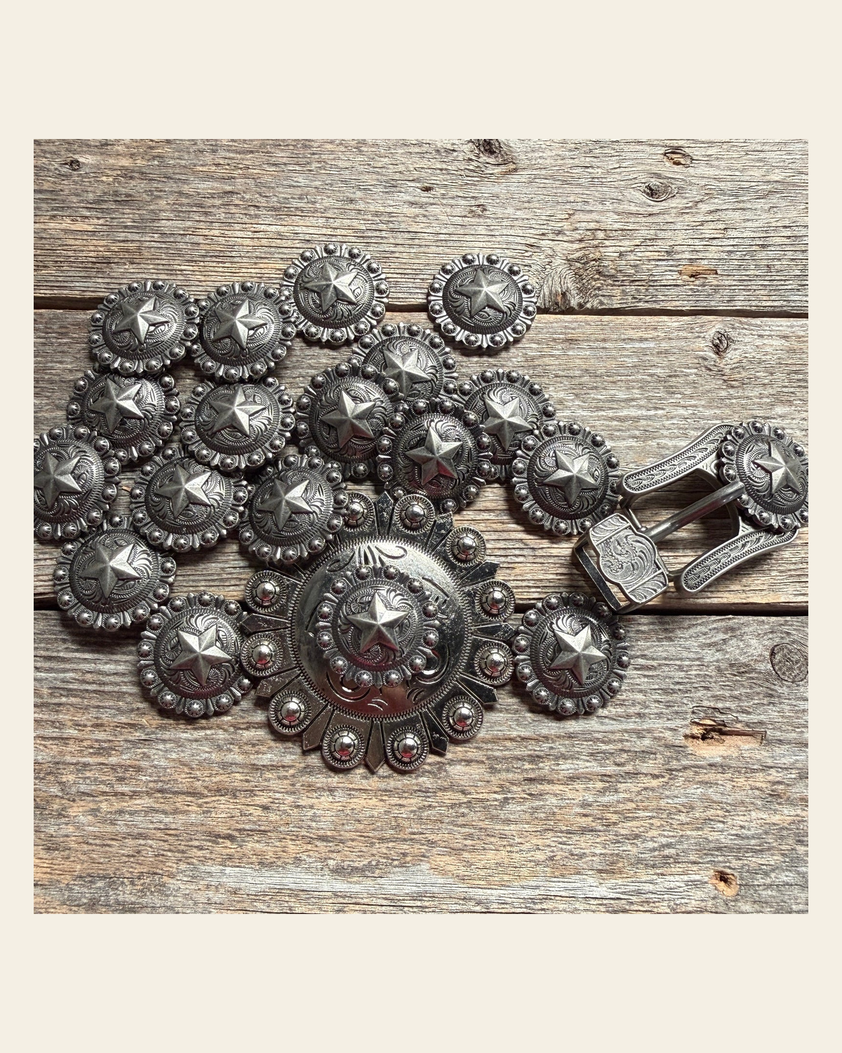 Antique Silver Star Western Concho W174 on a warm cream background