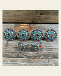 Antique Silver Tie-Dye Saddle Conchos on a warm cream background
