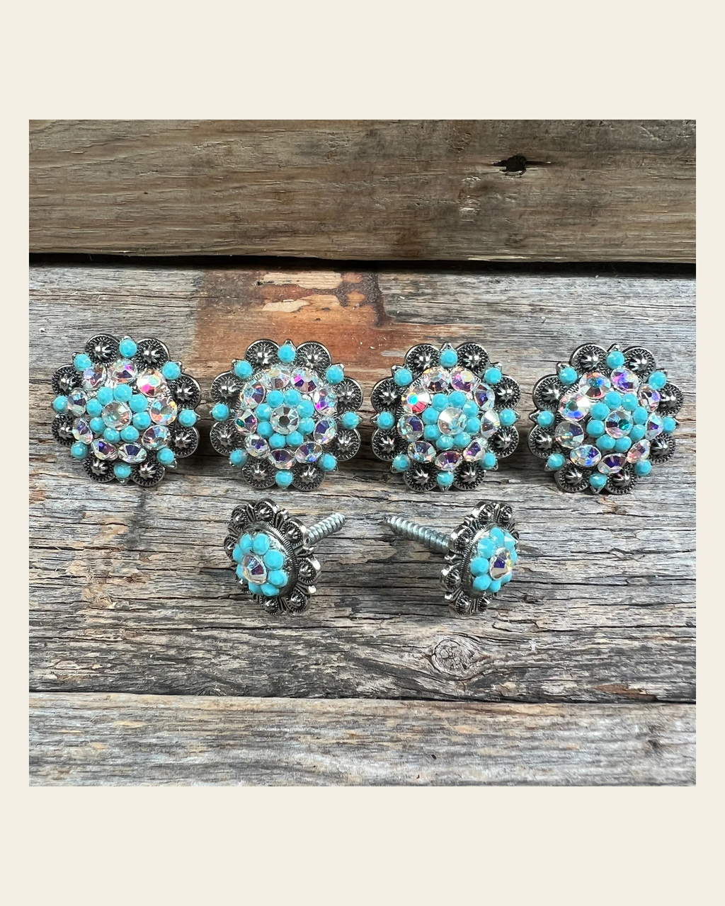 Antique Silver Turquoise & AB Saddle Conchos on a warm cream background