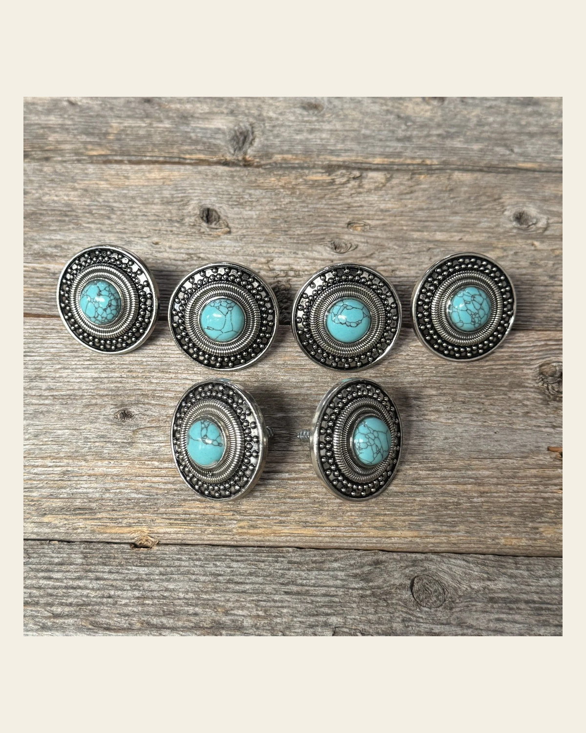 Antique Silver Turquoise Dot Saddle Set SSW232 on a warm cream background