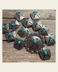 Antique Silver Turquoise Thunderbird Concho W181 on a warm cream background