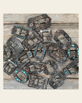 Antique Silver Western Buckles - Assorted on a warm cream background