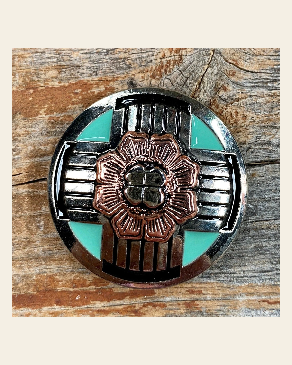 Antique Silver with Copper Flower Concho 1.5" W190L on a warm cream background