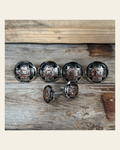 Antique Silver with Copper Flower Saddle Set SSW217 on a warm cream background