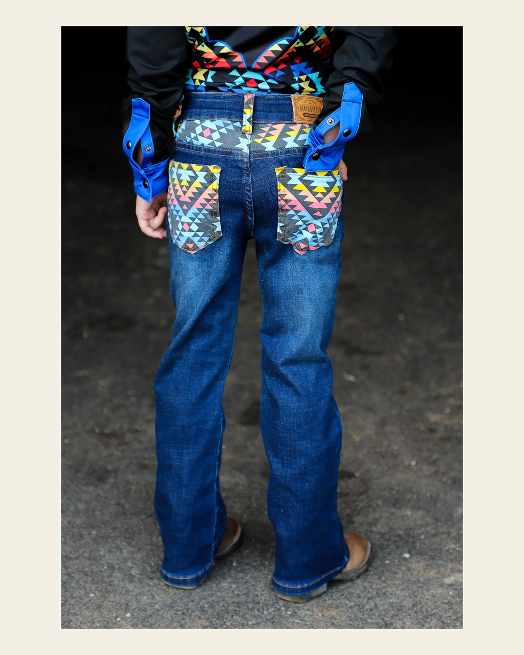 *youth* Arizona Bootcut Denim Jeans on a warm cream background