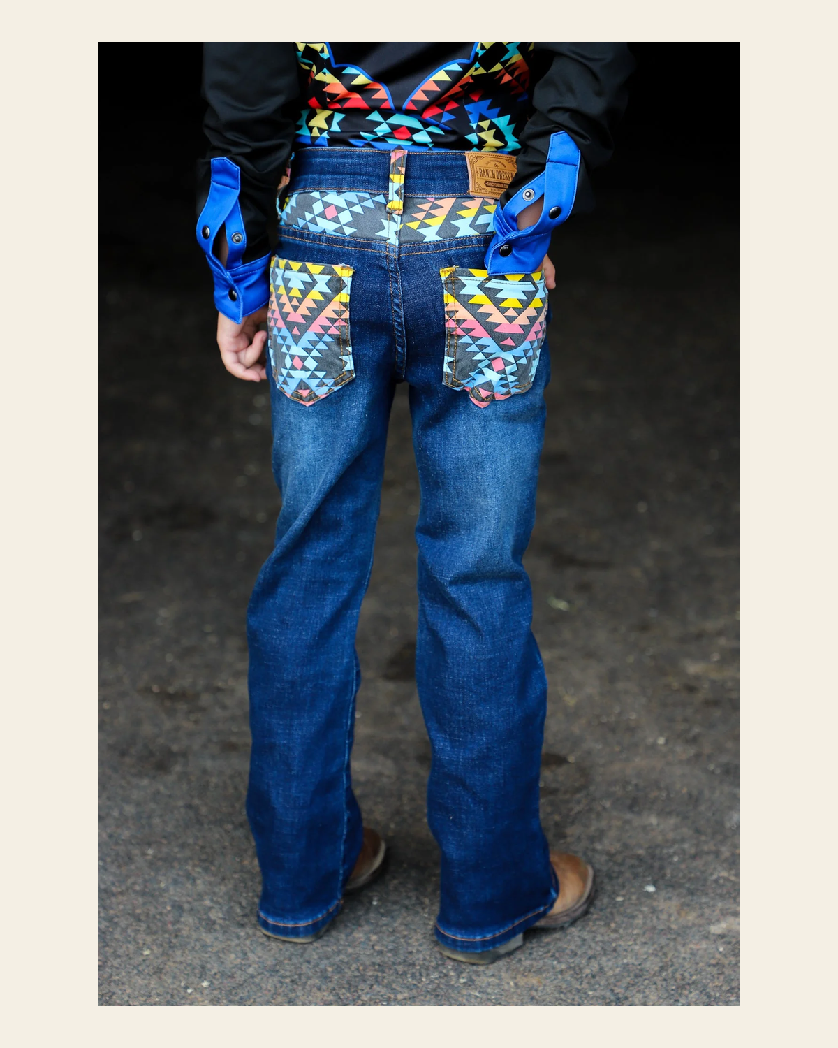 *youth* Arizona Bootcut Denim Jeans on a warm cream background