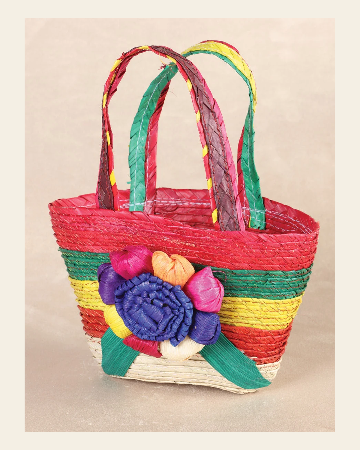 Artisanal Candy Party Bag 100% Palm Leaf Multicolor 602142 on a warm cream background