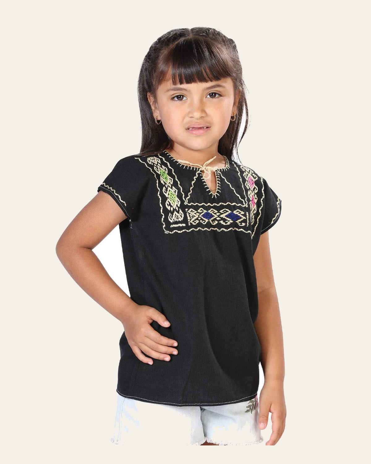 Artisanal Embroidered Blouse 100% Cotton Black 603596 on a warm cream background