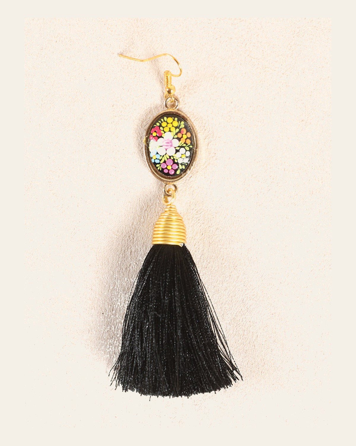 Artisanal Hand Painted Earrings Black 602168 on a warm cream background