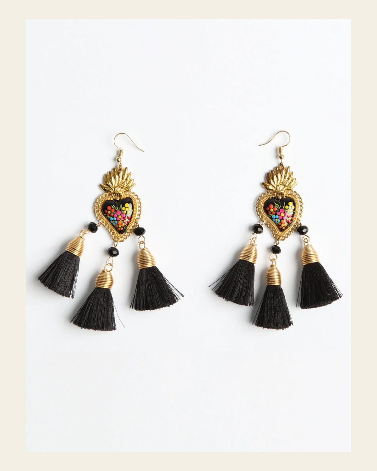 Artisanal Hand Painted Earrings Black 603974 on a warm cream background