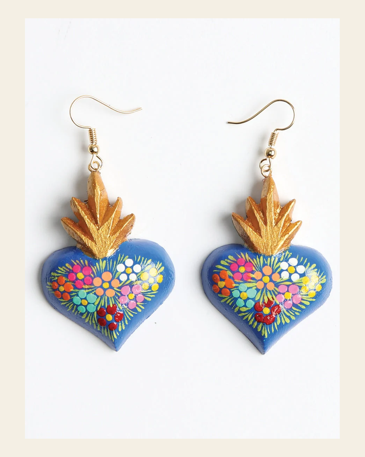 Artisanal Hand Painted Earrings Blue 603975 on a warm cream background