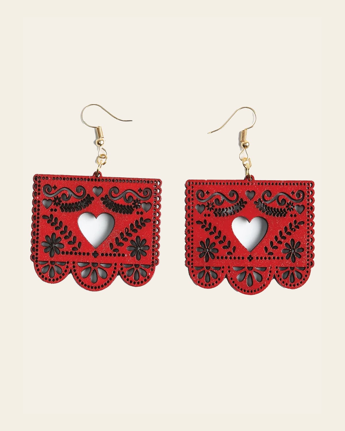Artisanal Handmade Earrings Wood Red 603950 on a warm cream background