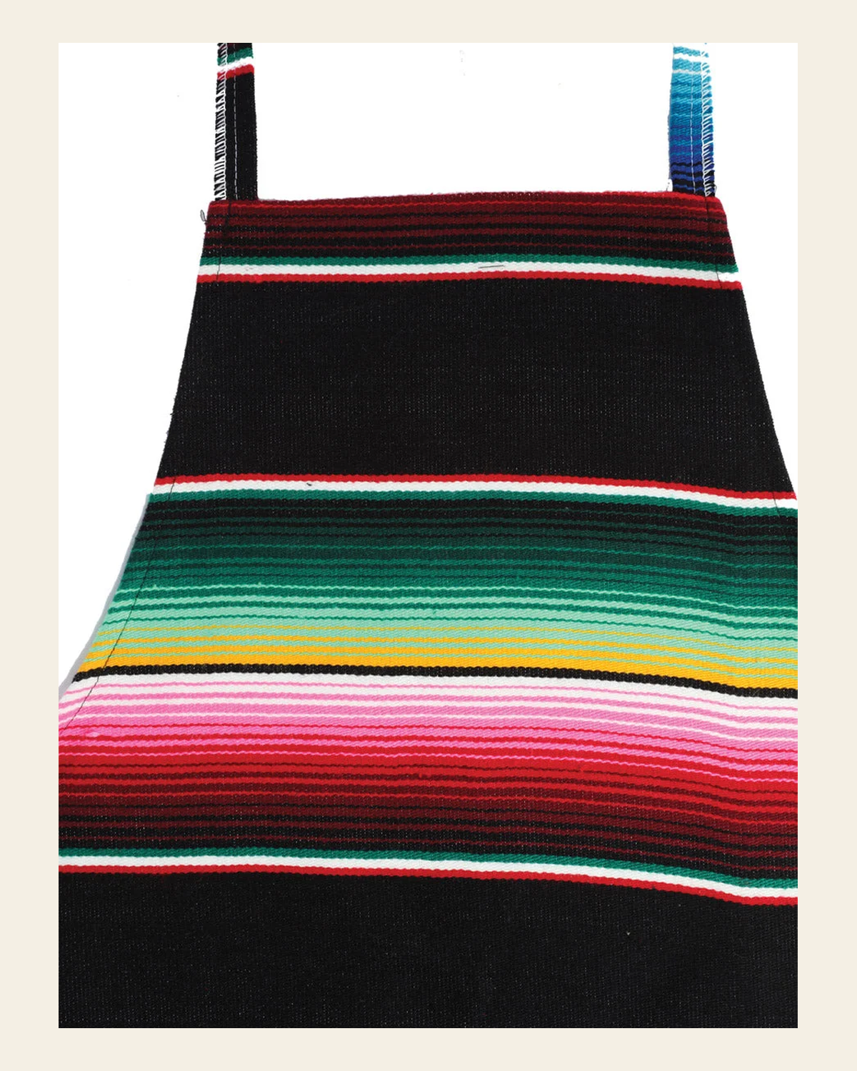 Artisanal Mexican Zarape Apron 100% Acrylan Black 603579 on a warm cream background