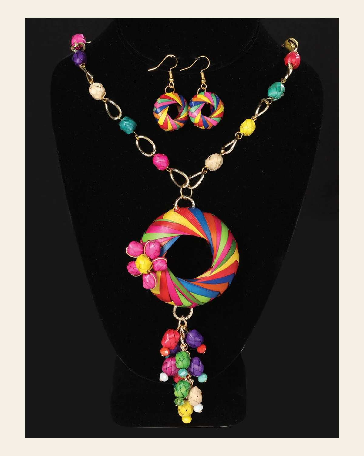 Artisanal Set Earrings-Necklace Palm Multicolor 603237 on a warm cream background
