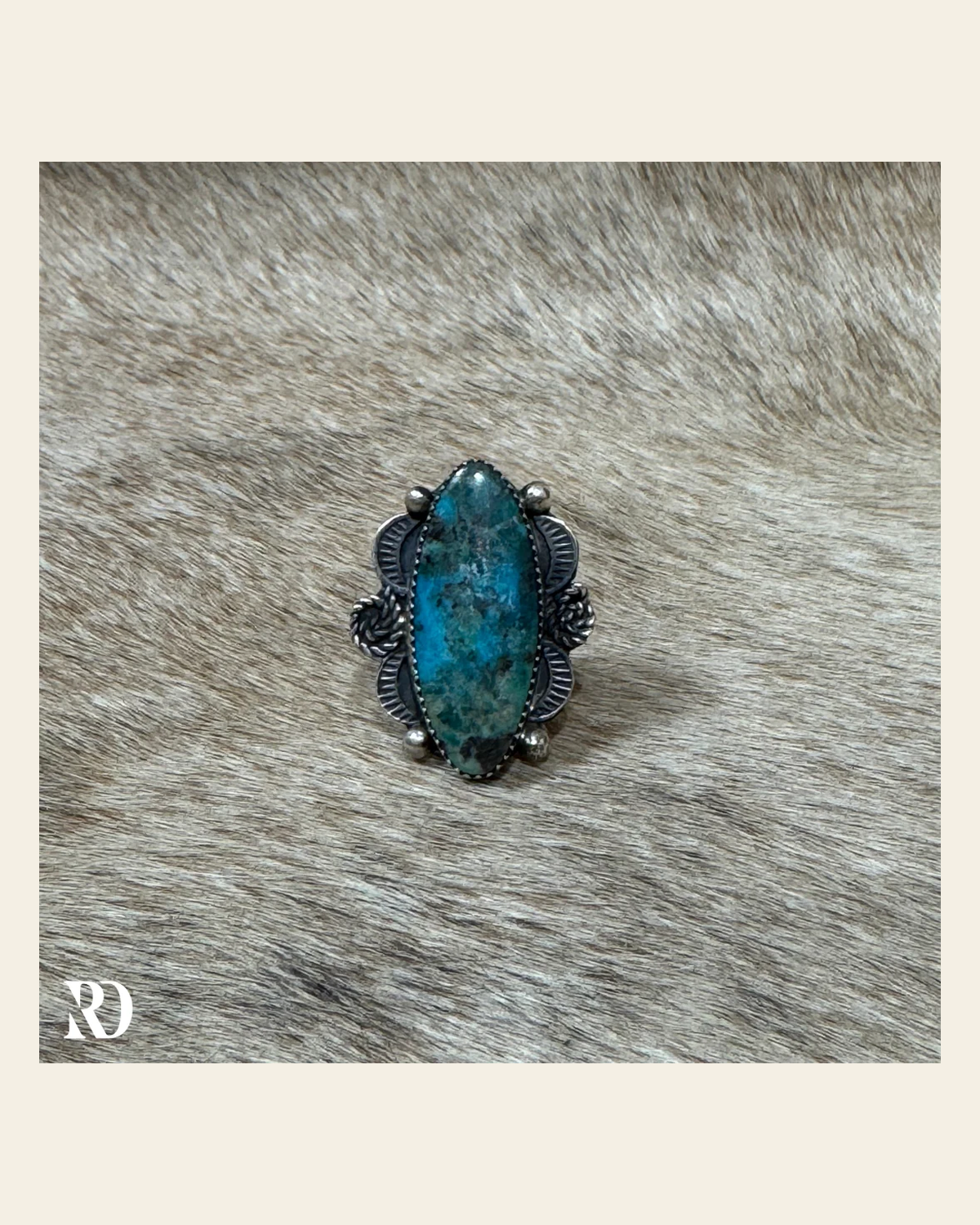 Authentic Turquoise Adjustable Ring By Tia Long on a warm cream background