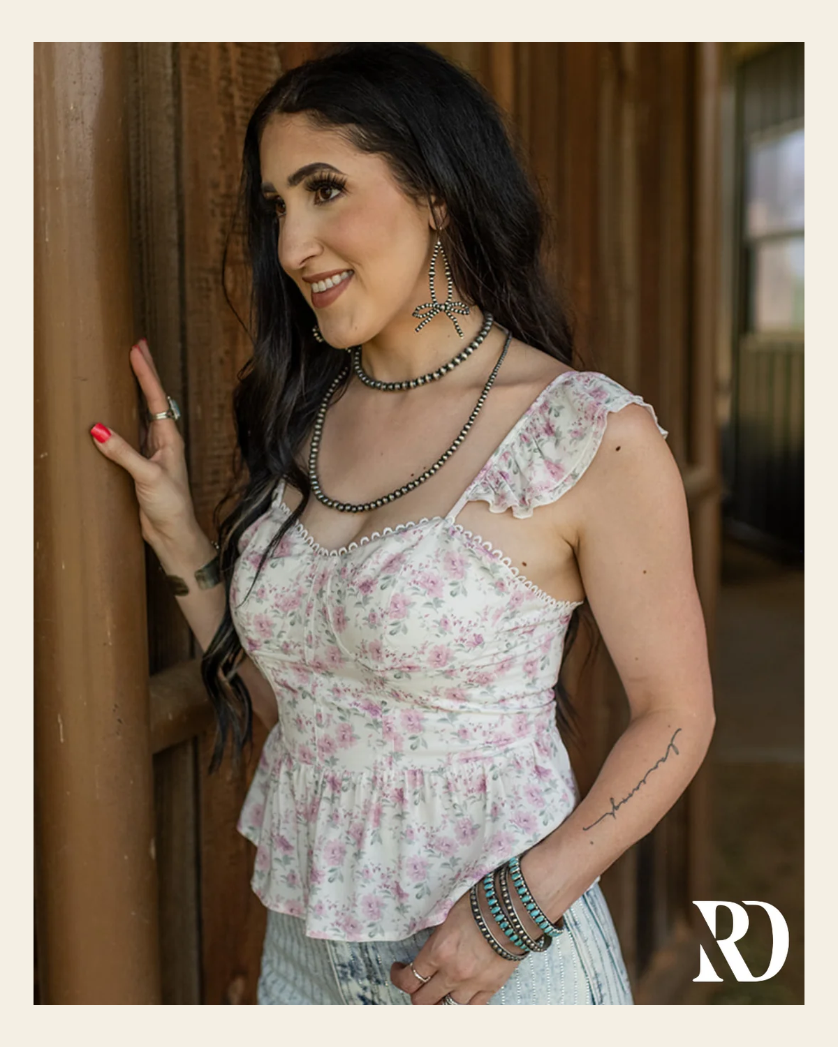 Ava Floral Tank | Top on a warm cream background