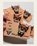 Bag of 25 -Boutique 3d Printed Package Inserts Cool Highland Cow Hat Pin Made in America on a warm cream background
