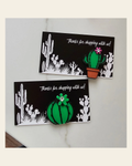Bag of 25 -Boutique 3d Printed Pins or Magnets Package Inserts Cactus Made in America on a warm cream background