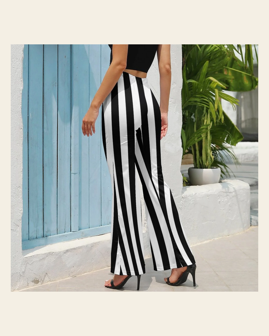 Baha Ranch Beetlejuice Striped Flare Pants on a warm cream background