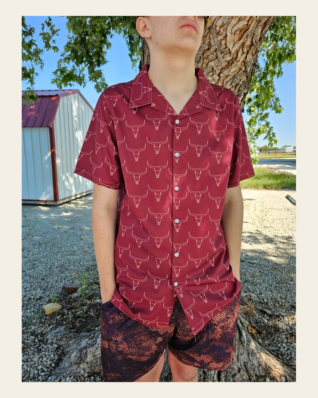 Baha Ranch Burgandy Longhorn Men's Western Camp Shirt on a warm cream background