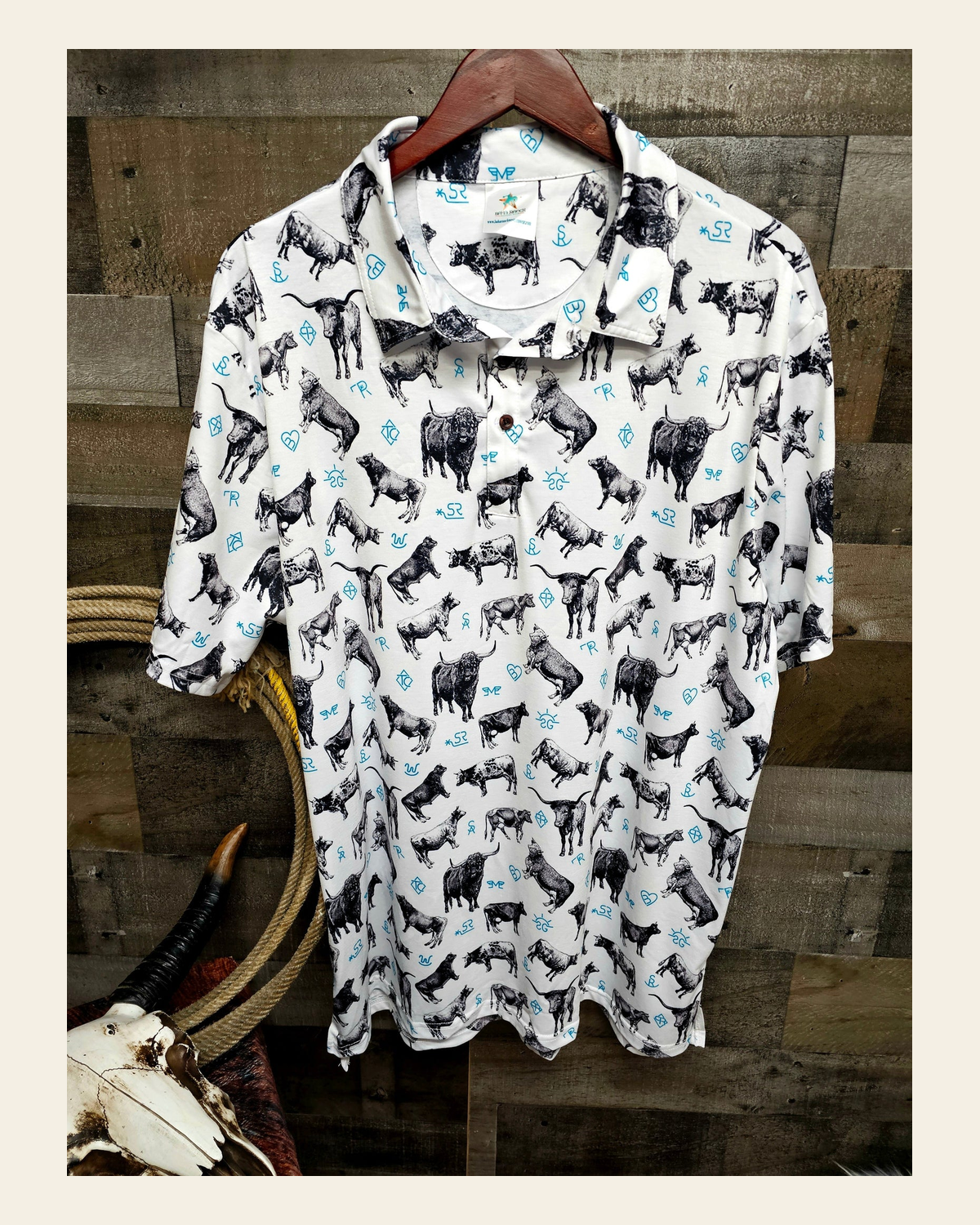 Baha Ranch Cattle and Brands Men's Western Polo Shirt on a warm cream background