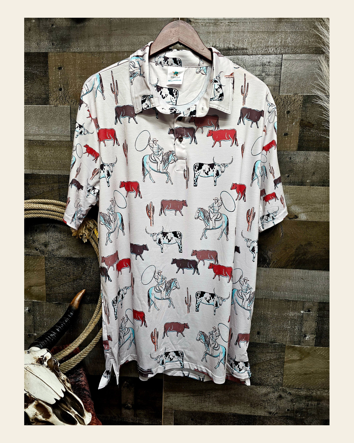 Baha Ranch Cattle Drive Men's Western Polo Shirt on a warm cream background