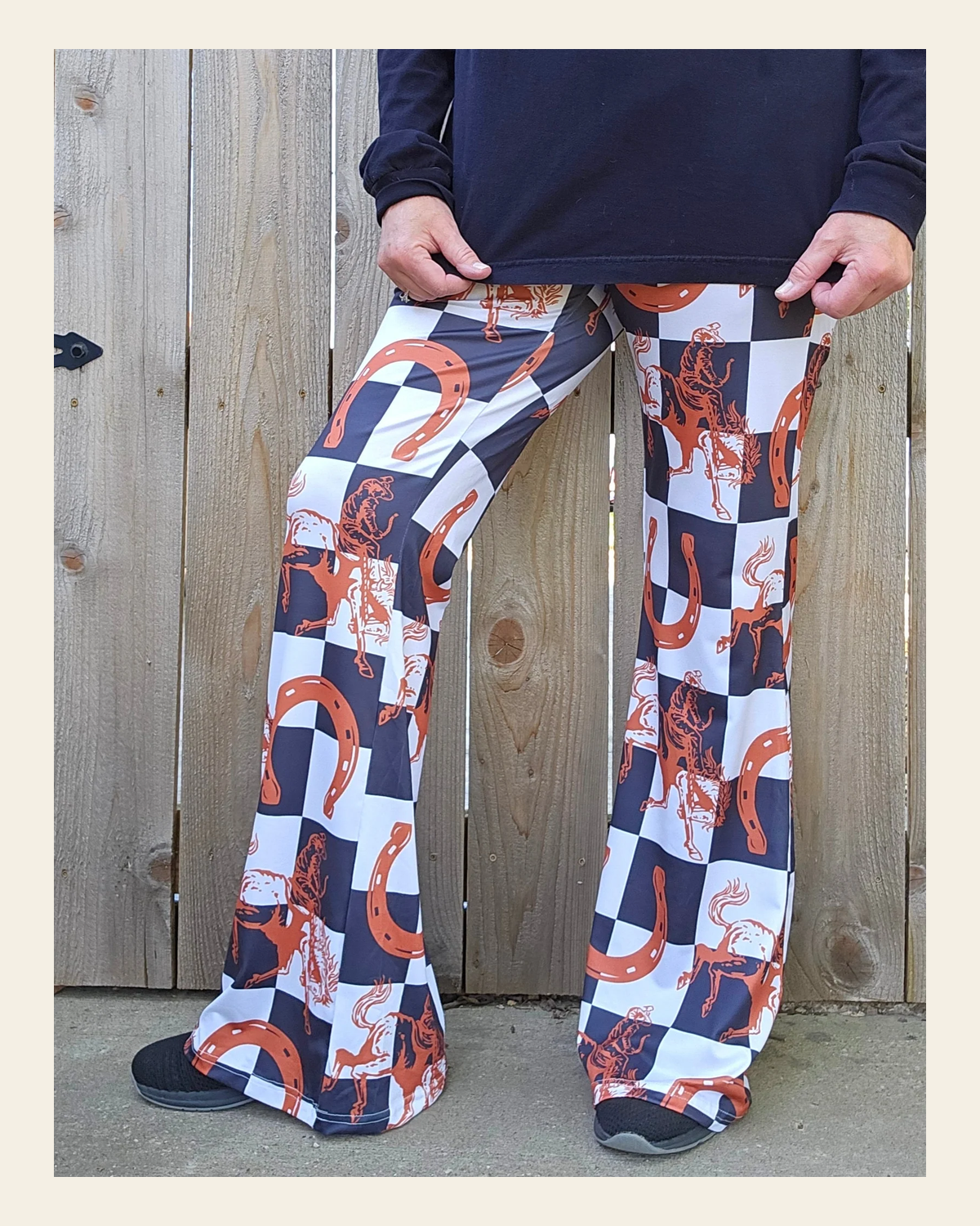 Baha Ranch Checkered Rodeo Flare Pants on a warm cream background